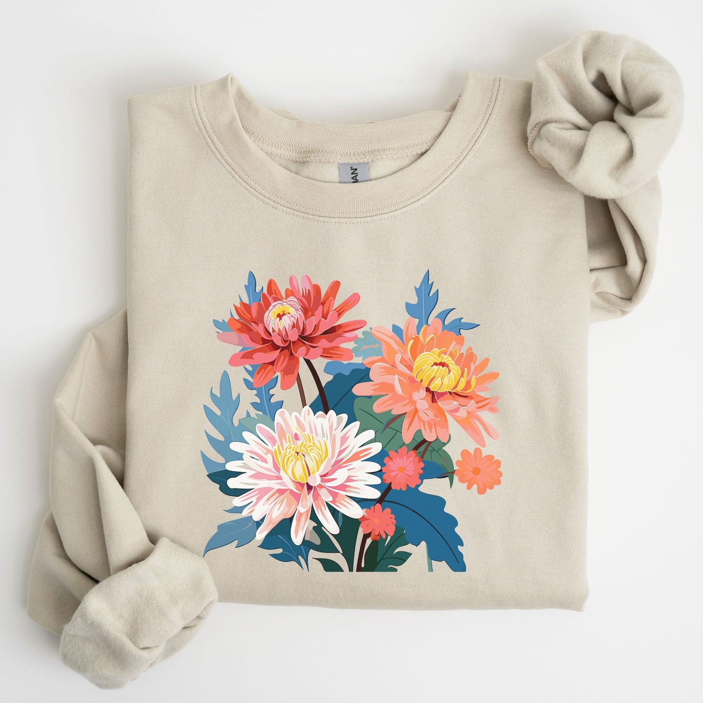 Beige sweatshirt with colorful floral design on a white background