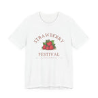 White t-shirt with 'Strawberry Festival' graphic on a white background