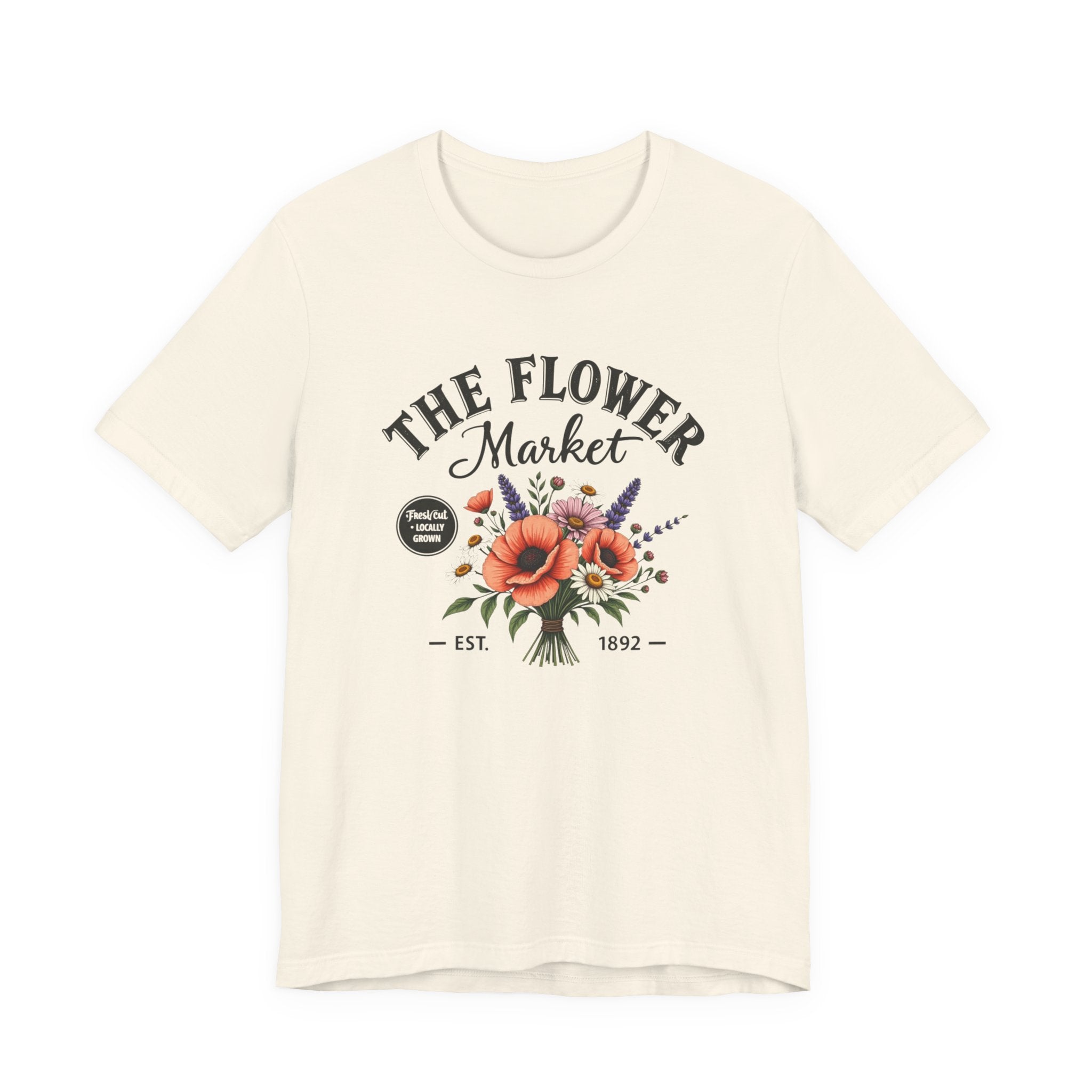 Beige t-shirt with 'The Flower Market' graphic design on a white background