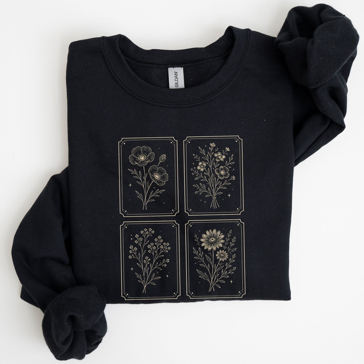 Black sweatshirt with celestial design on a white background