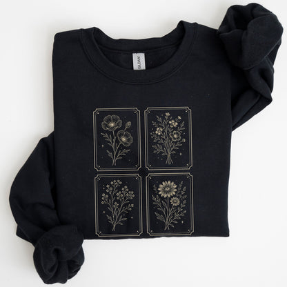 Black sweatshirt with celestial design on a white background