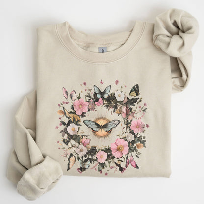 Beige sweatshirt with floral and butterfly design on a white background
