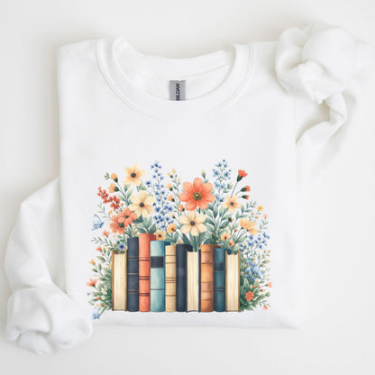 White sweatshirt with a design of books and flowers on a white background
