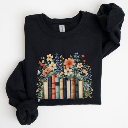 Black sweatshirt with floral and book design on a white background
