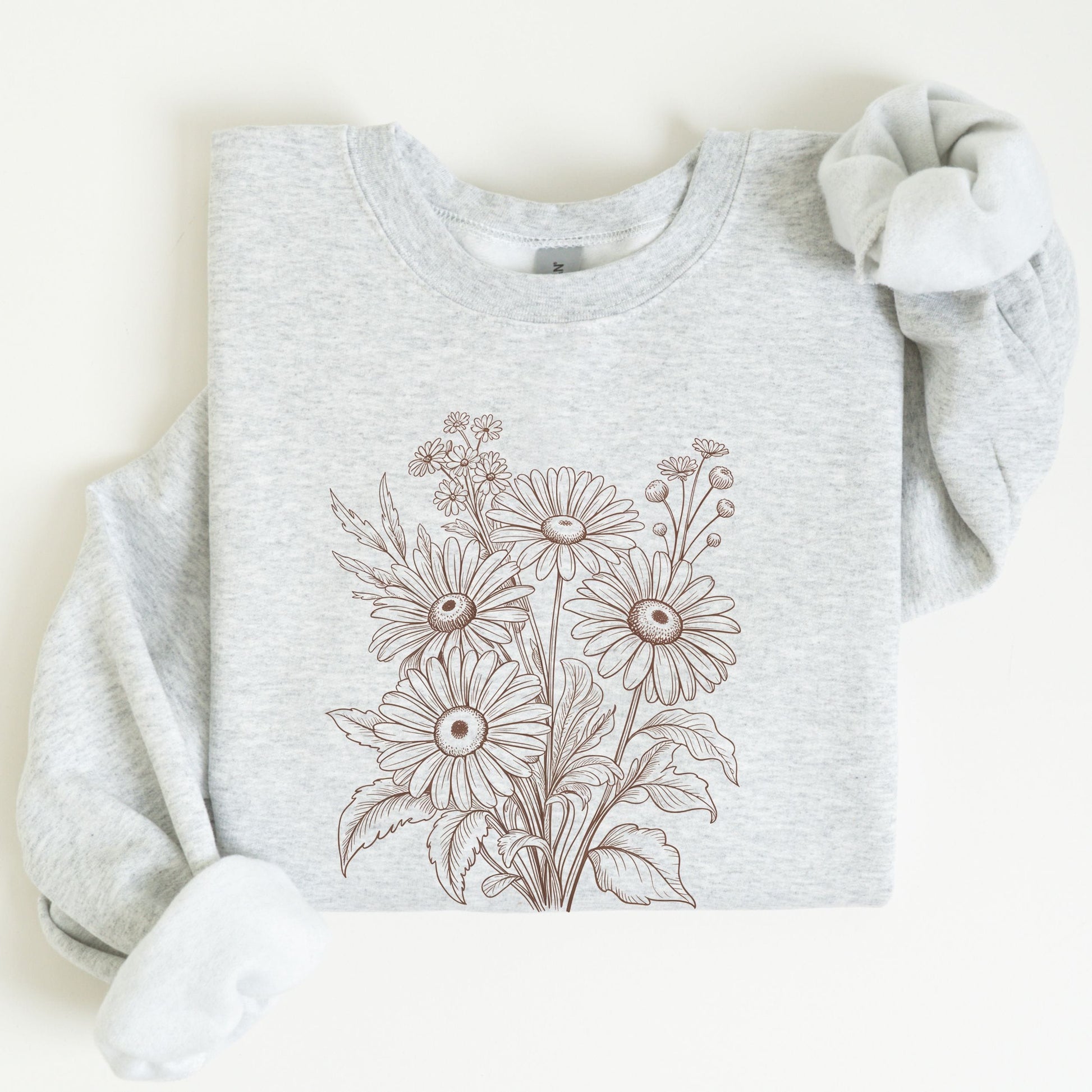 Gray sweatshirt with floral design on a white background
