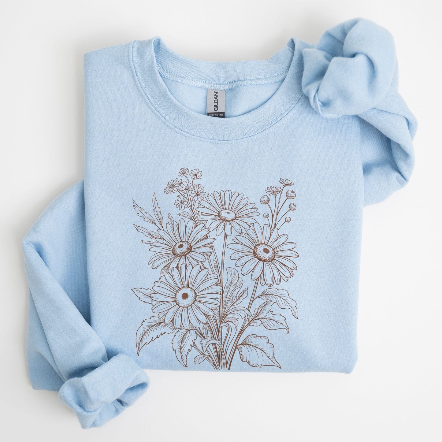 Light blue sweatshirt with floral design on a white background