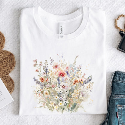 White t-shirt with a floral design on a light gray surface