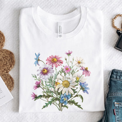 White long sleeve t-shirt with floral design on a textured surface
