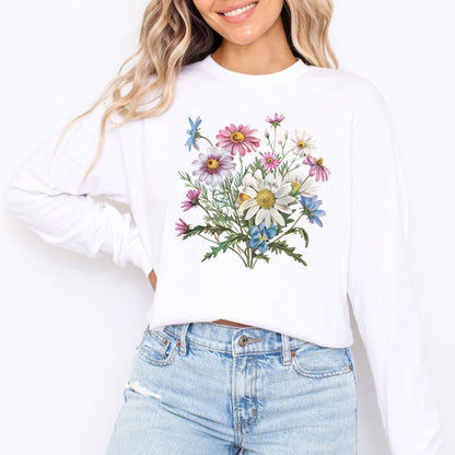 White long sleeve t-shirt with floral design worn by a person on a white background