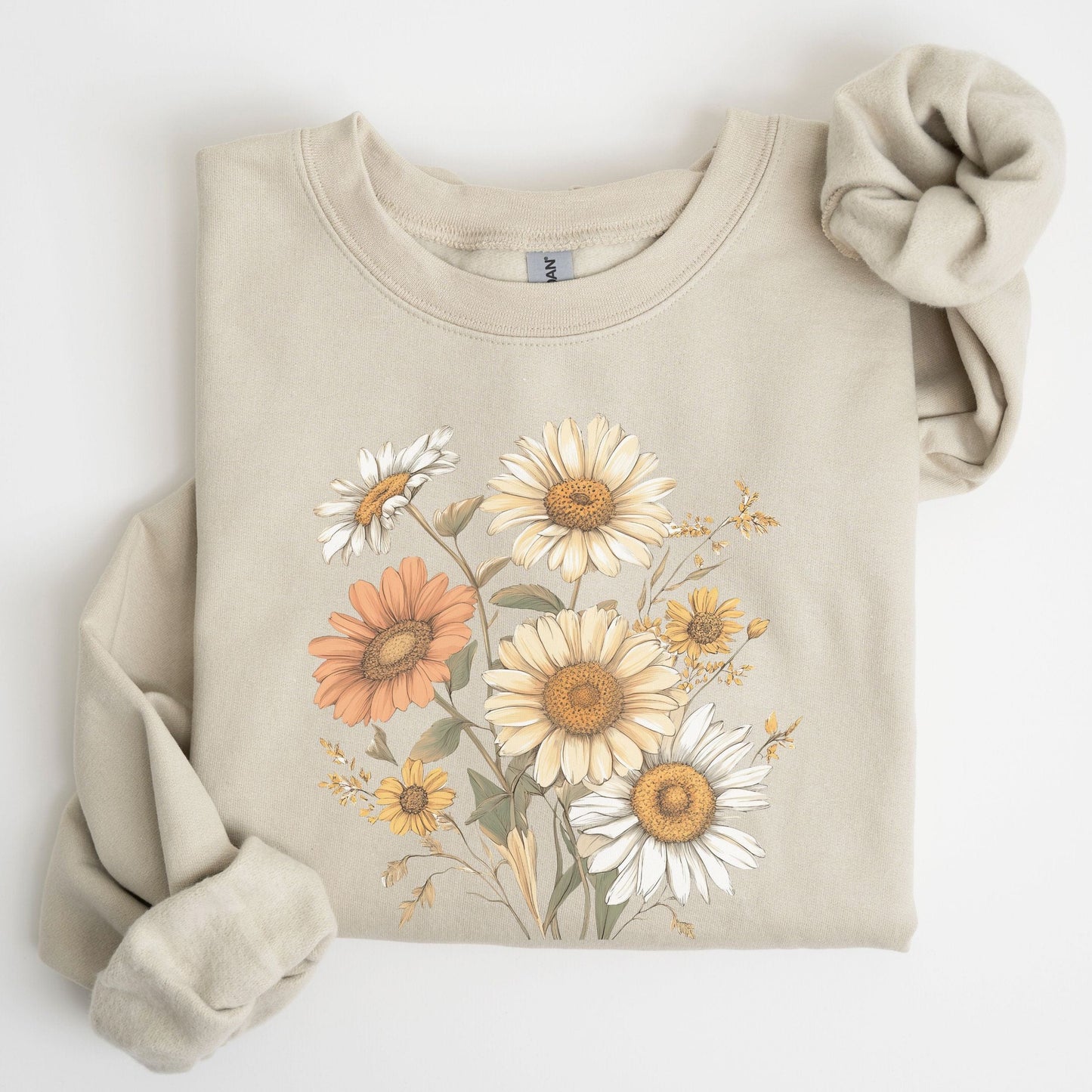 Beige sweatshirt with floral design on a white background