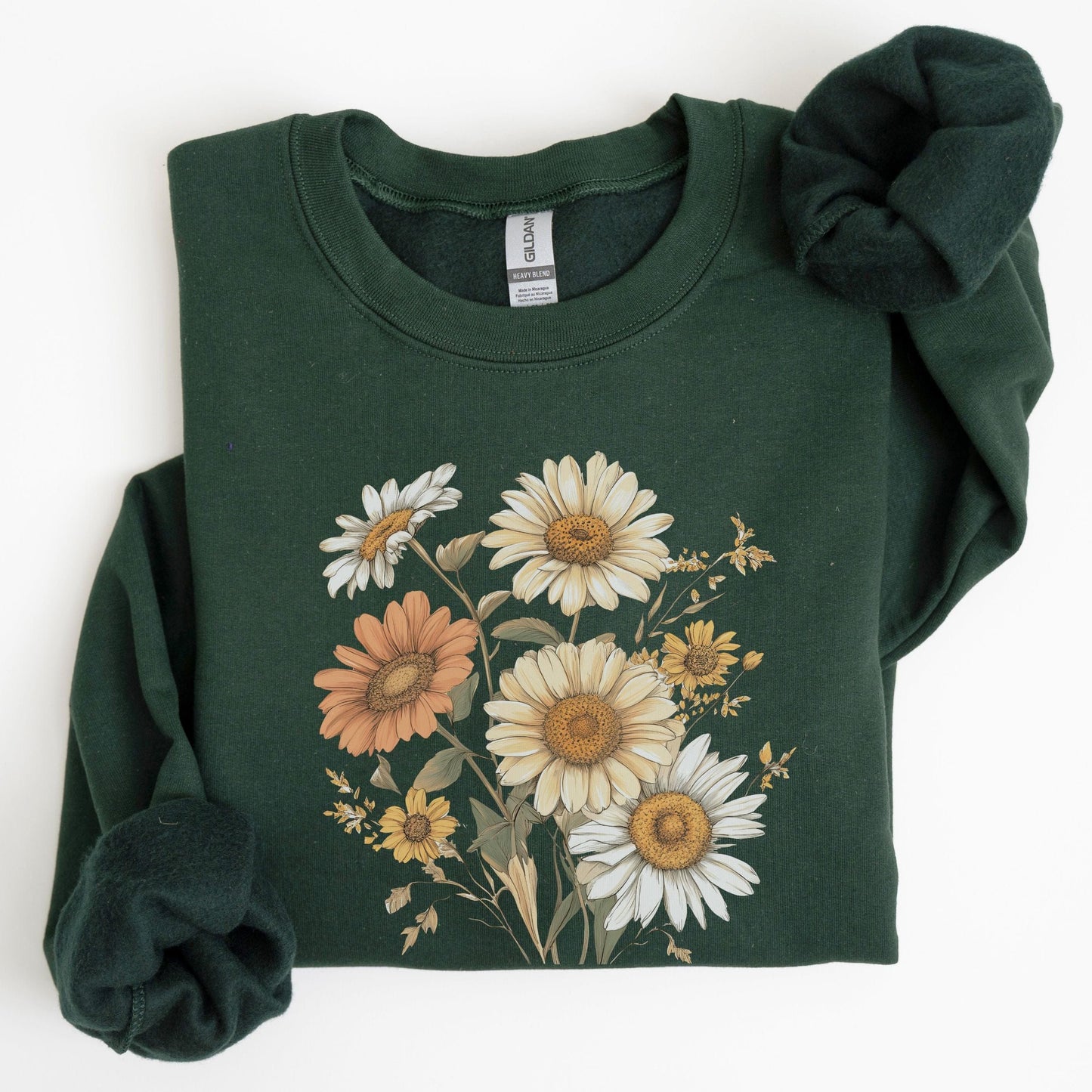 Green sweatshirt with floral design on a white background