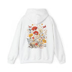 White hoodie with floral design on the back against a white background