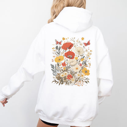 White hoodie with floral design on the back against a white background