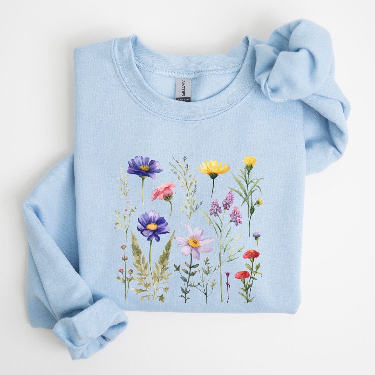 Light blue sweatshirt with floral design on a white background