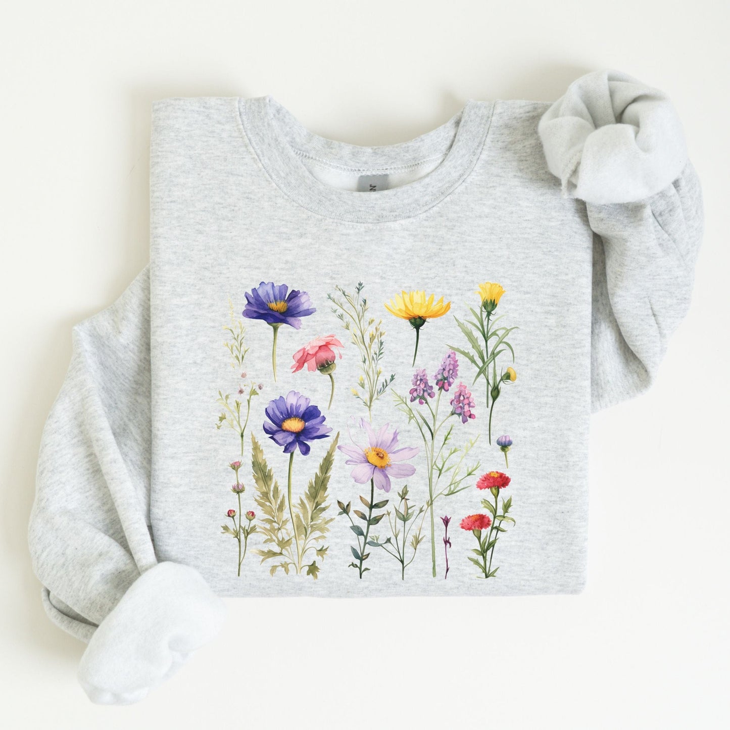 Gray sweatshirt with colorful floral design on a white background