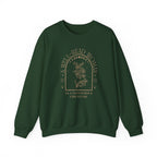 Green sweatshirt with 'A Well-Read Woman is a Dangerous Creature' text on a white background