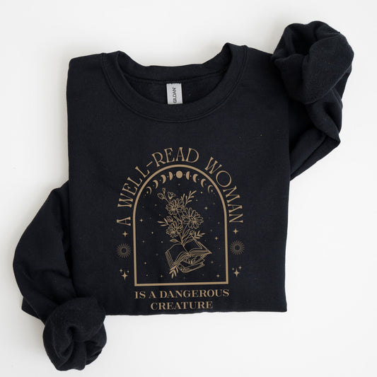 Black sweatshirt with 'A Well-Read Woman is a Dangerous Creature' text and design on a white background