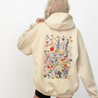 Beige hoodie with floral design on the back against a white background