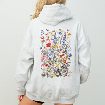 Gray hoodie with a colorful floral design on the back against a plain background