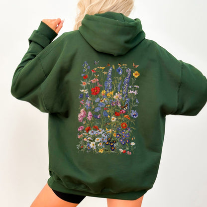 Green hoodie with floral design on the back against a white background