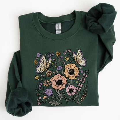 Green sweatshirt with floral and butterfly design on a white background