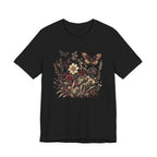 Black t-shirt with floral and butterfly design on a white background