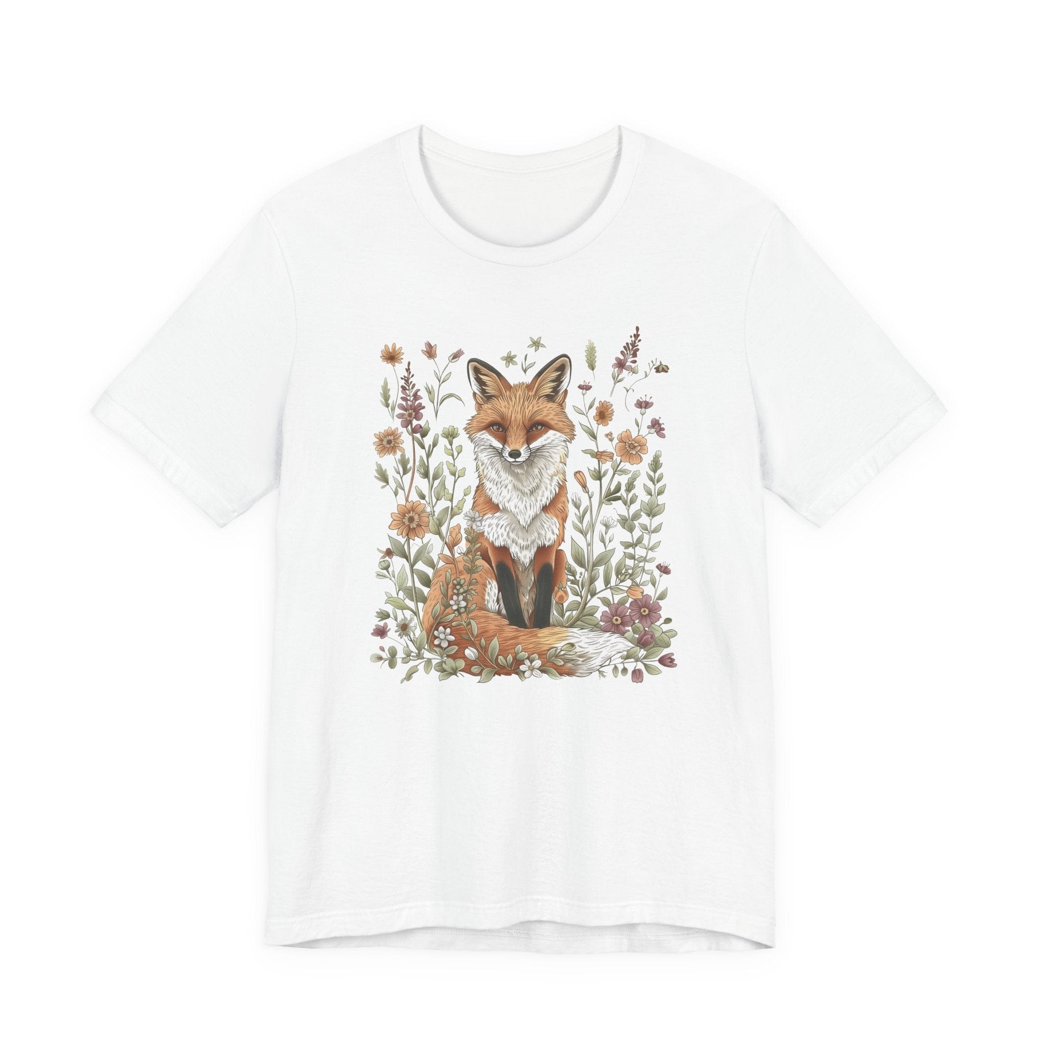 Flat lay of white t-shirt featuring woodland fox surrounded by flowers