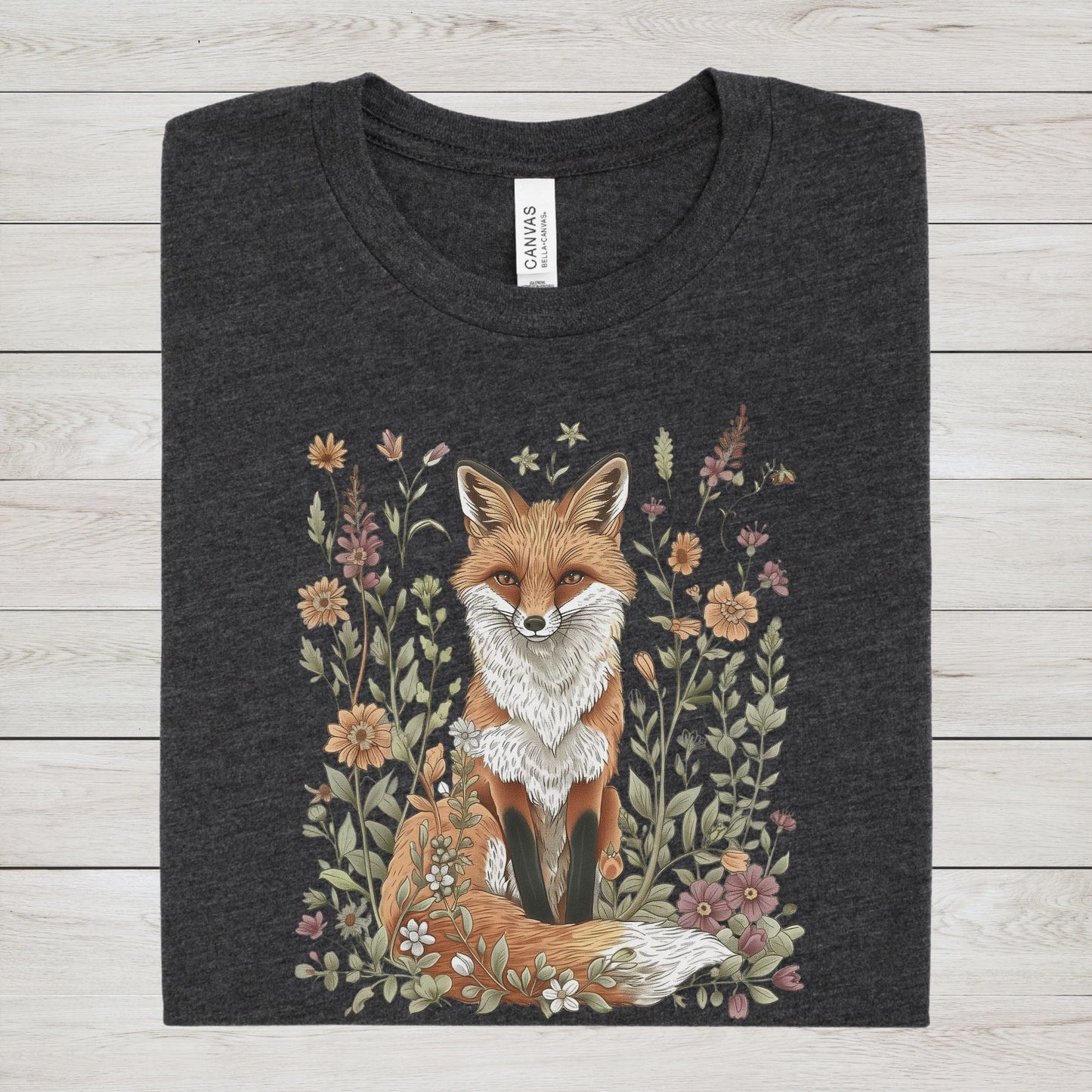 Flat lay of dark grey heather t-shirt featuring woodland fox surrounded by flowers