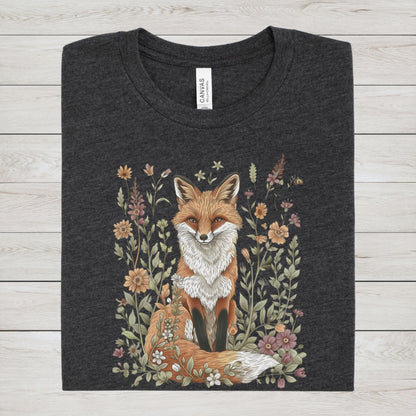 Flat lay of dark grey heather t-shirt featuring woodland fox surrounded by flowers